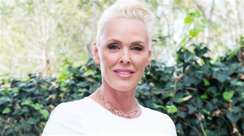 Brigitte Nielsen wows in swimsuit photo as she twins。